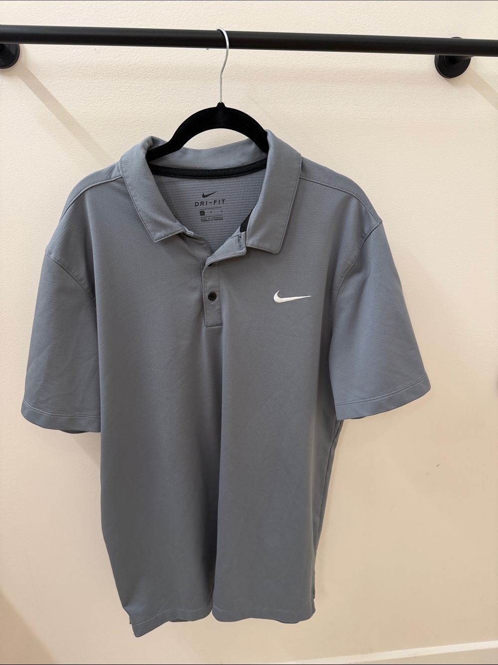 Nike Men's Light Grey Polo Shirt with White Swoosh